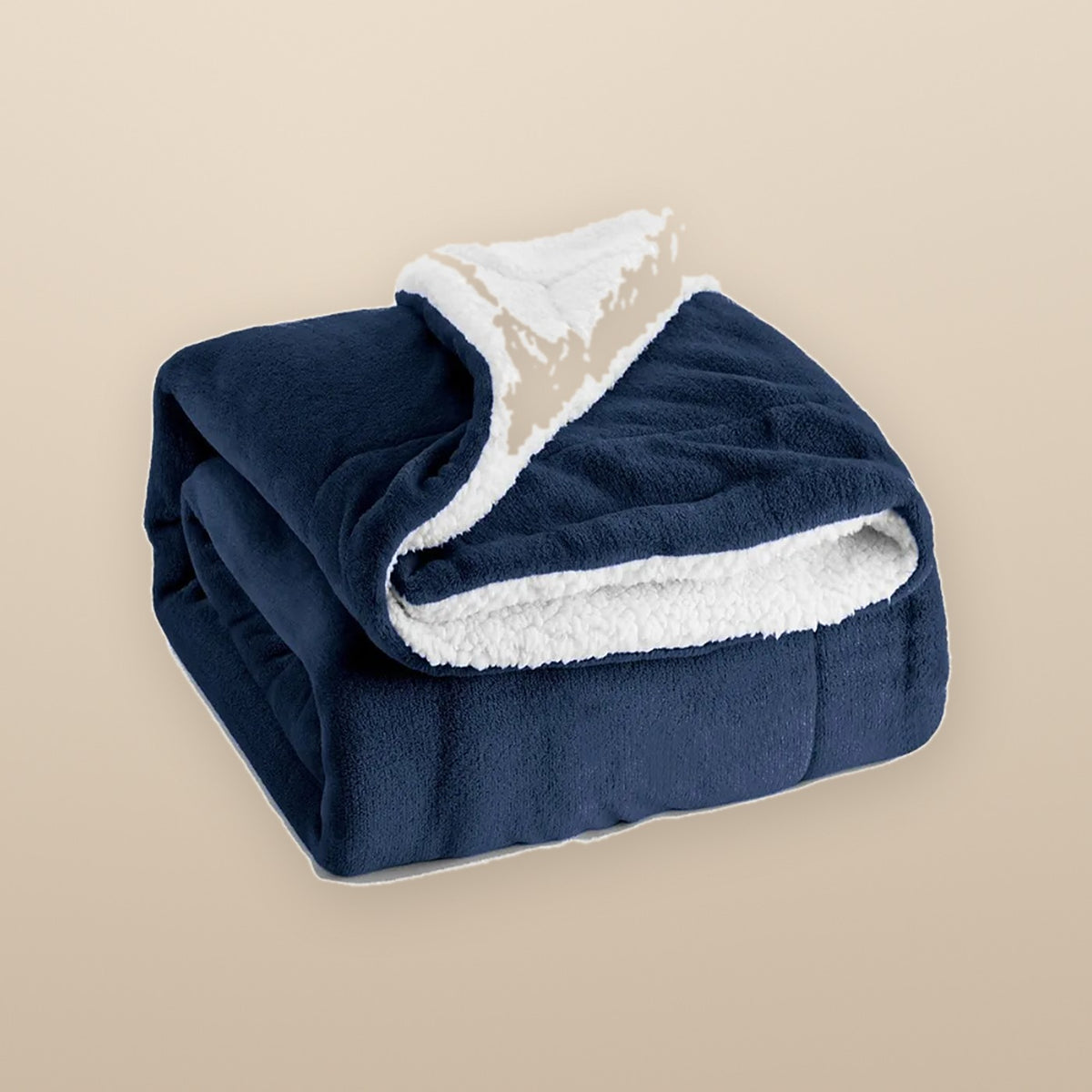The Hearth reversible sherpa throw in Tibetan blue, folded to show the sherpa lining